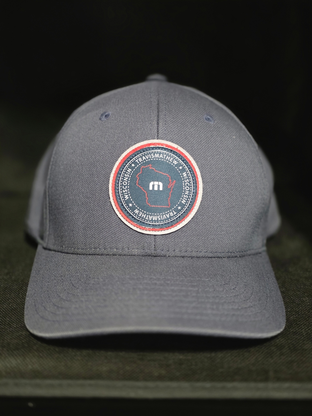 Travis Mathew Gray Baseball Cap with Wisconsin Patch